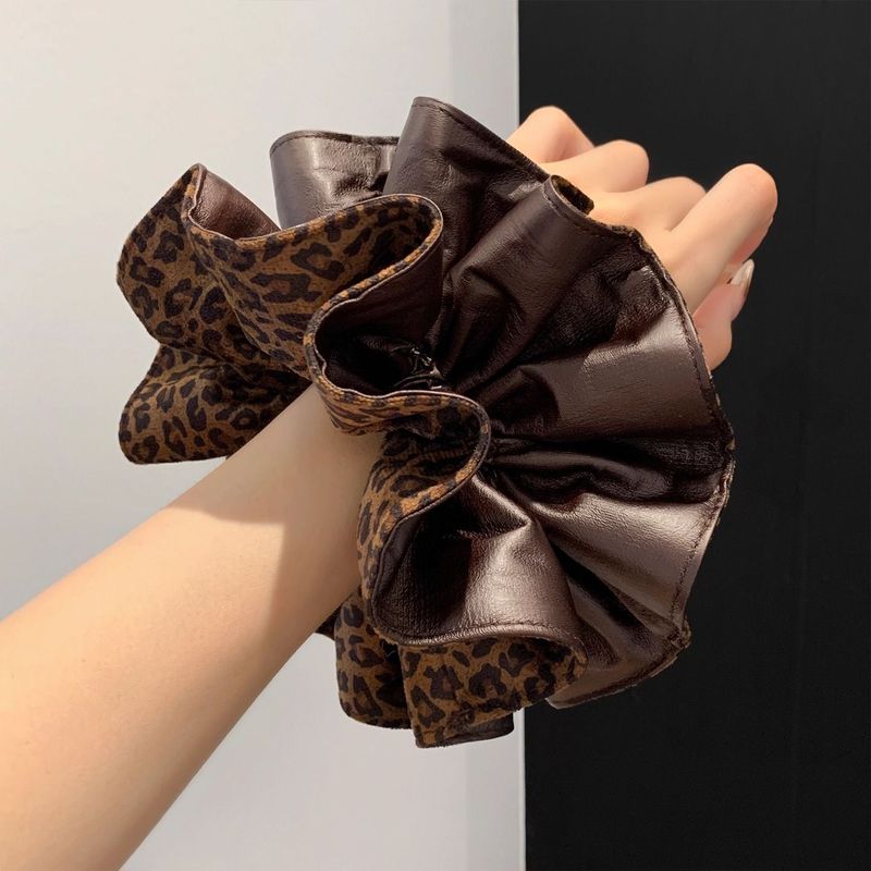 قطعة واحدة من عصابة رأس كعكة ن - مراجعة Leatherwork Pony وسعره